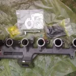 R527696 R519485 kolektor wydechowy 6630 John Deere oryginał  R527696 R519485 kolektor wydechowy 6630 John Deere oryginał